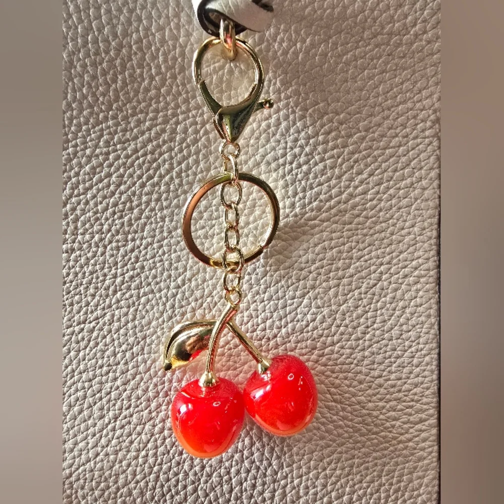Cherry Keychain with Gold Accents